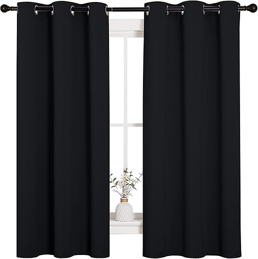 NICETOWN Halloween Pitch Black Solid Thermal Insulated Grommet Blackout Curtains/Drapes for Bedroom Window (2 Panels, 42 inches Wide by 63 inches... NICETOWN Halloween Pitch Black Solid Thermal Insulated Grommet Blackout Curtains/Drapes for Bedroom Window (2 Panels, 42 inches Wide by 63 inches...